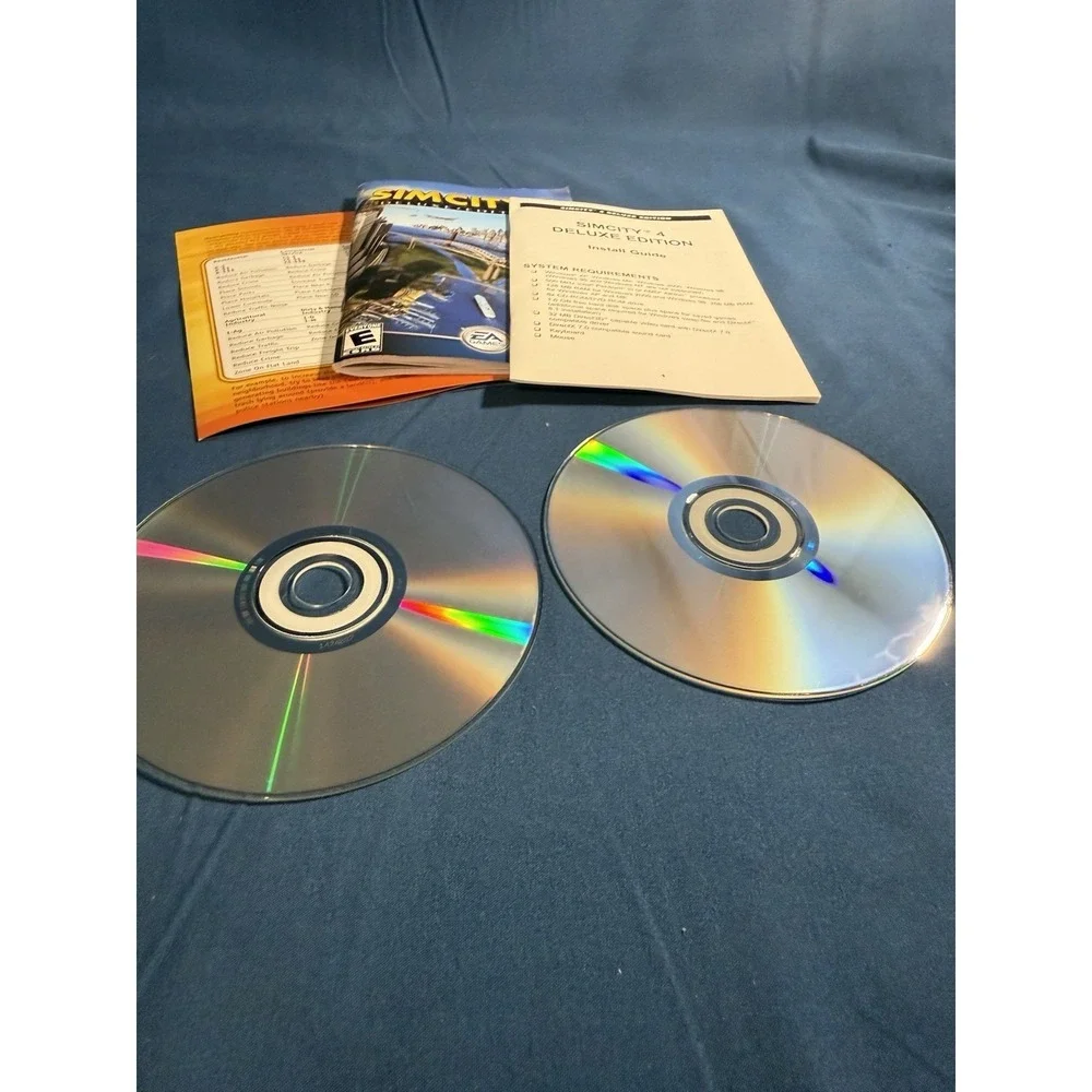 SIM CITY 4: Deluxe Edition (PC Game CD-ROM, 2003) 2 Discs with Manual in Case.